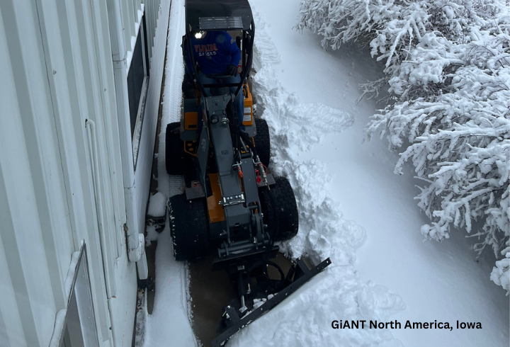 G1200 TELE clears snow on a narrow sidewalk in Iowa.